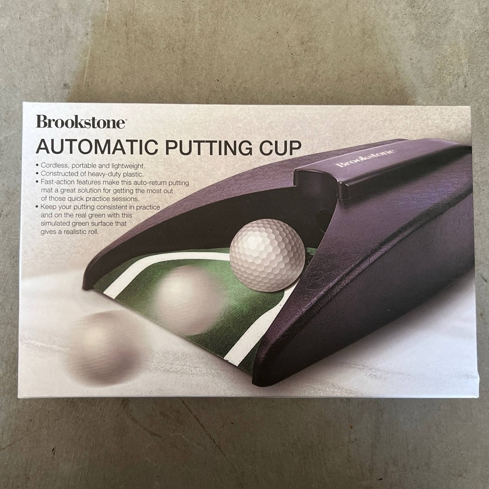 Brookstone  Automatic Return Putting Cup